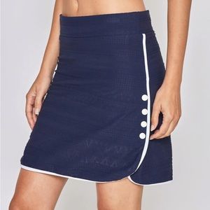 L’Etoile Sport Side Snap Skort.